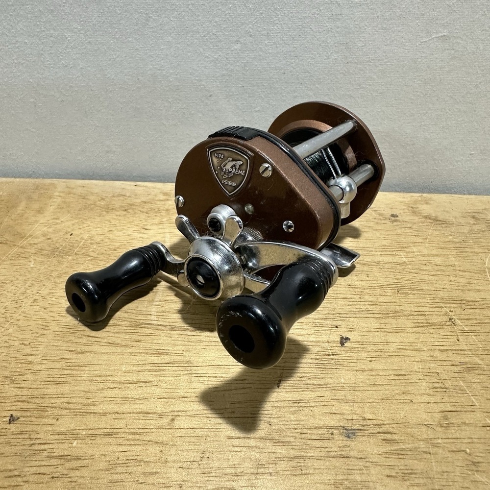 Vintage Pflueger Supreme 610B Bait Casting Fishing Reel Brown USA‎ Made